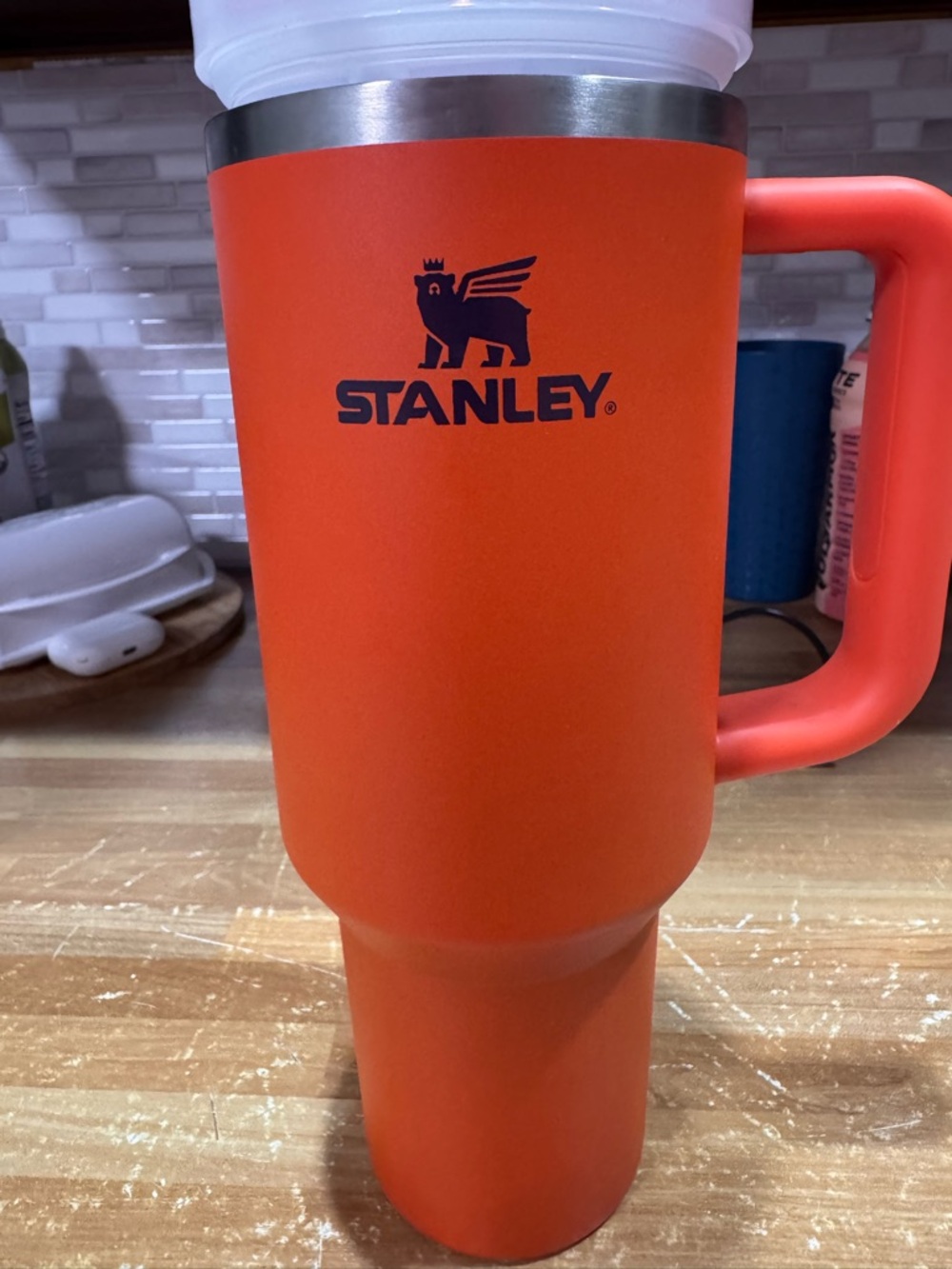 Stanley Orange Travel Mug with Navy Logo